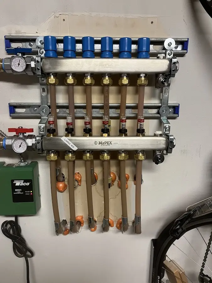 Plumber performing Gas Line Installation at a residential property in Omak